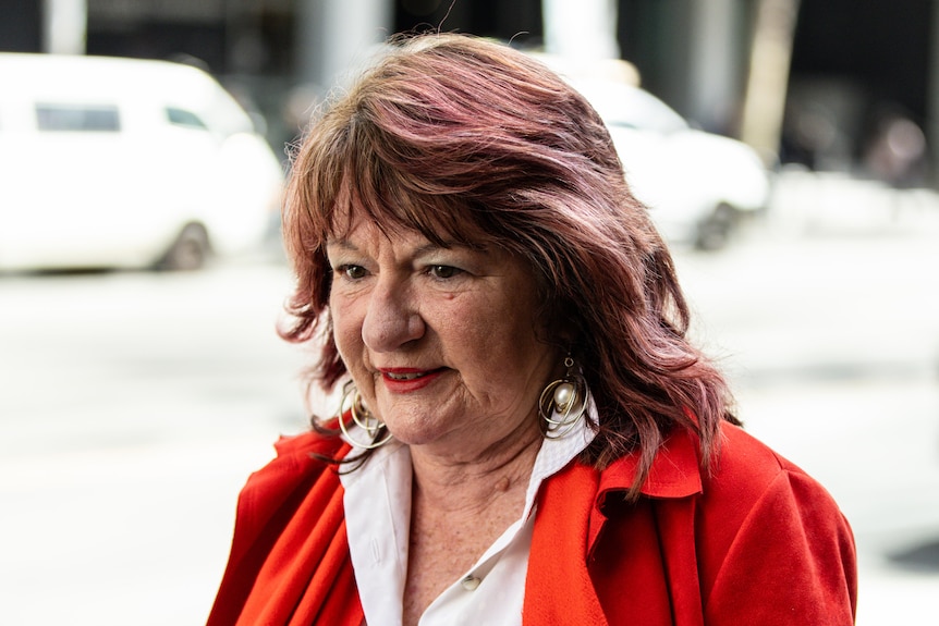 John Burke's sister, Suzanne Heppell, departs from the Supreme Court of Victoria in Melbourne.