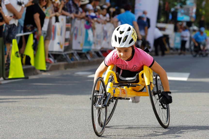 Brydi Saul digs deep to keep going in a wheelchair race.