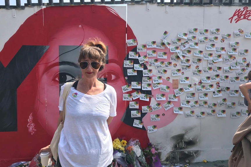 "Yes" supporter Jenny Headen at the mural of Savita Halappanavar in Dublin.