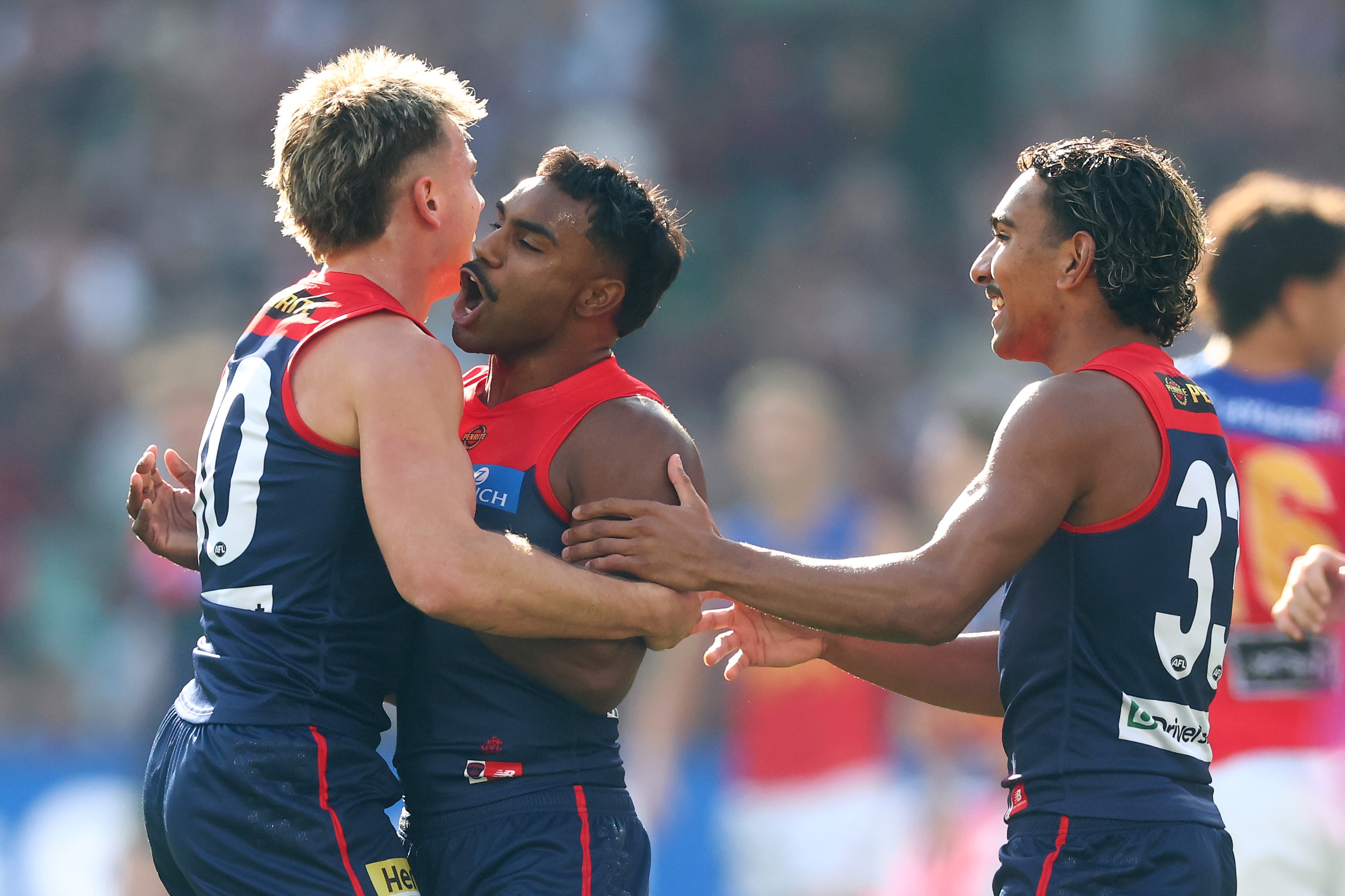 Demons cling on for epic win over Lions as Freo makes light work of Eagles