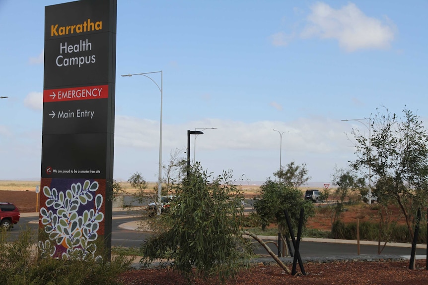 A sign out the front of a hospital that reads "Karratha Health Campus".
