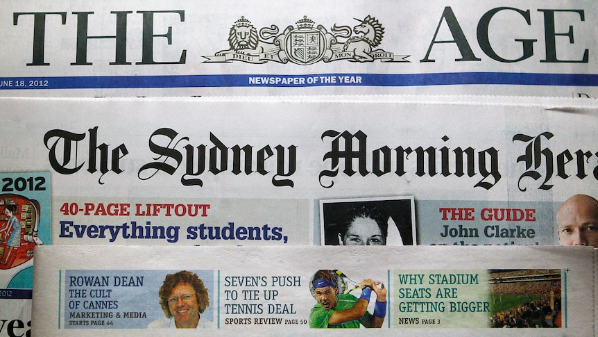 Mastheads of The Age, The Sydney Morning Herald and the Australian Financial Review, are pictured in Sydney on June 18, 2012.
