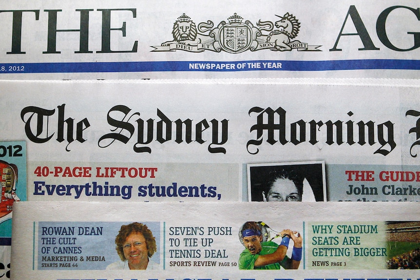 Mastheads of The Age, The Sydney Morning Herald and the Australian Financial Review, are pictured in Sydney on June 18, 2012.