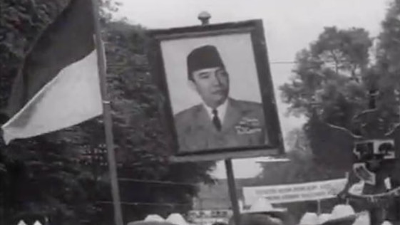 Poster of Sokarno (?) held during street march