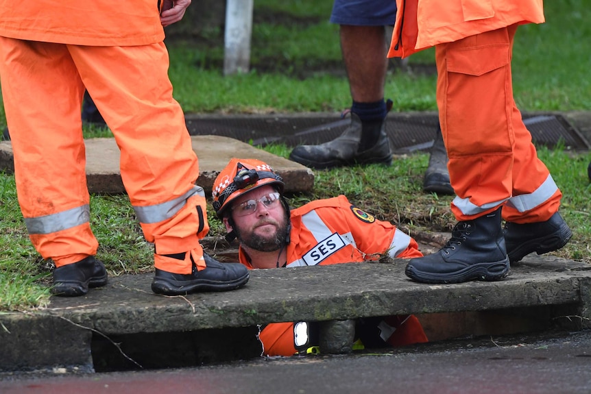 A man in a drain.