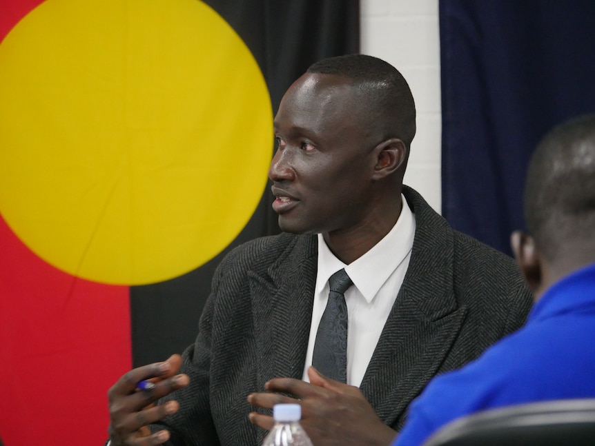 Beny Bol talks during a meeting. 