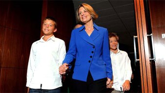 New NSW Premier Kristina Keneally with her sons, after being elected the state's first female leader (AFP/Tracy Nearmy).