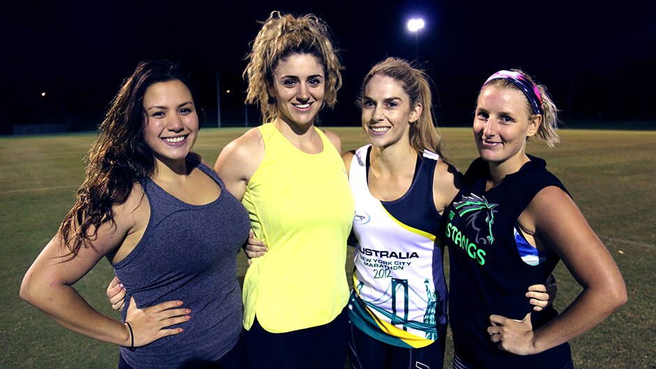 Canberra Mustangs teammates Cassie Dawson, Dani de Groot, Bridget Dowling and Brook Crisp after training.