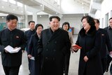 North Korean leader Kim Jong-un walking.