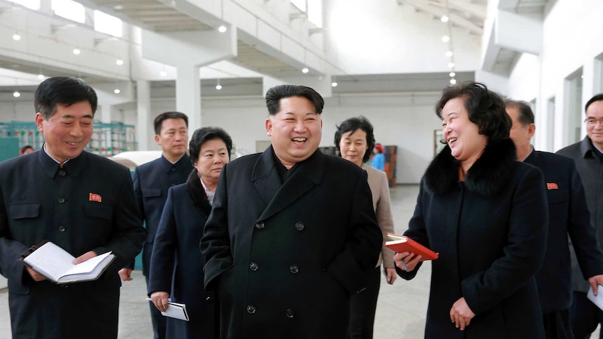 North Korean leader Kim Jong-un walking.