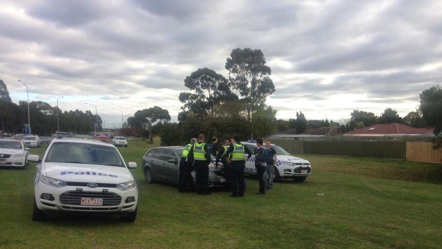Police on the scene in Narre Warren, where a woman was stabbed.