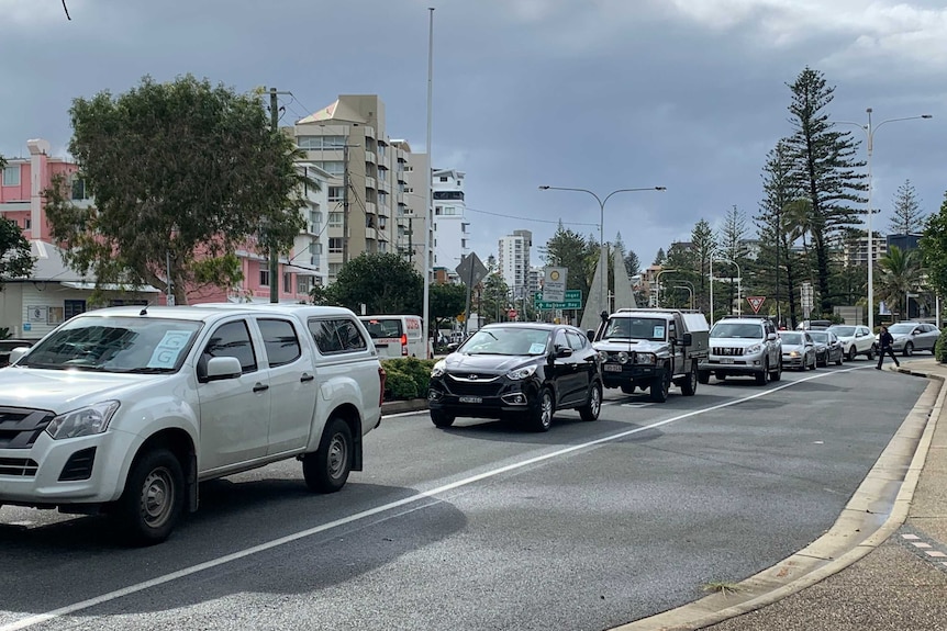 A triffic jam with police monitoring cars