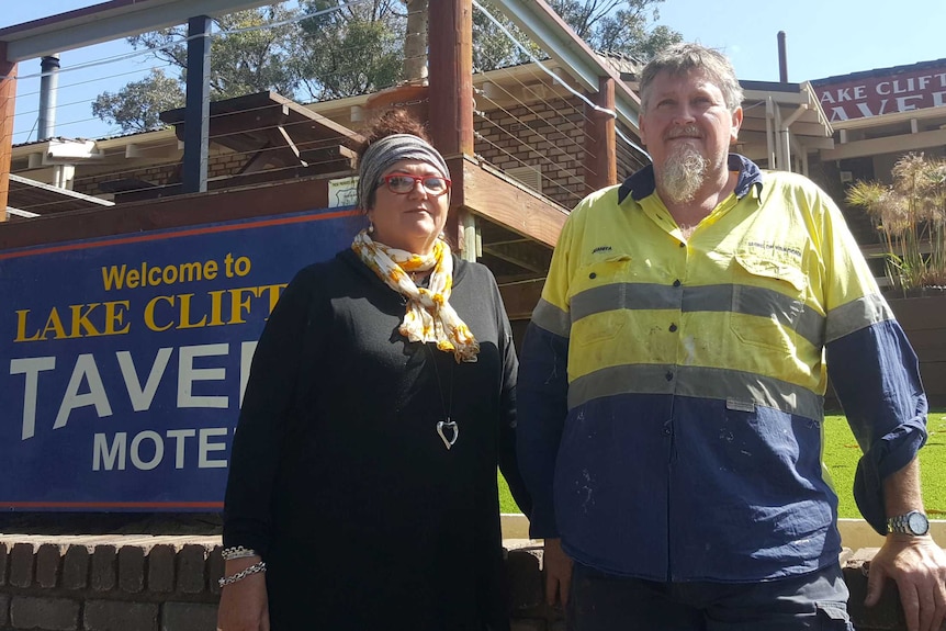 Juanita and Dean Musgrave stand in front of the old Lake Clifton pub.