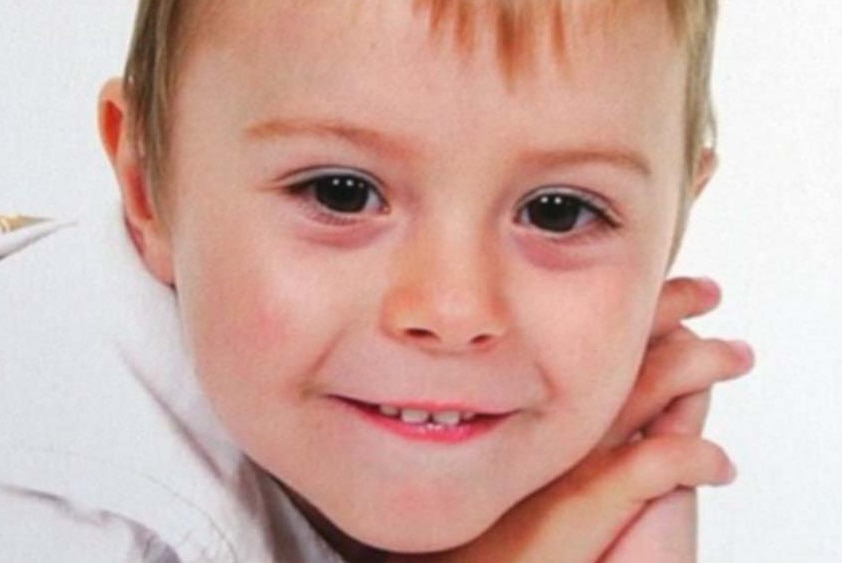 Smiling photo of four-year-old Tyrell Cobb wearing a white shirt.