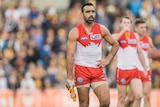 Adam Goodes looks on after Swans' loss to West Coast