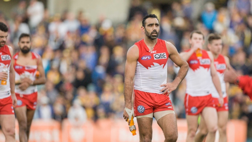 Adam Goodes looks on after Swans' loss to West Coast