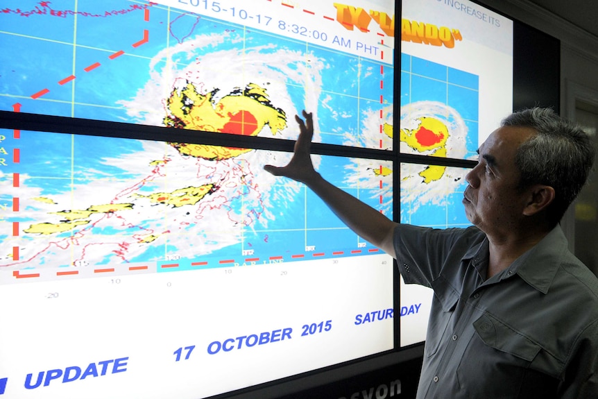 Philippine authorities fear powerful typhoon Koppu will linger over the Philippines for almost three days, bringing prolonged heavy rain, possible floods and sparking storm surges.