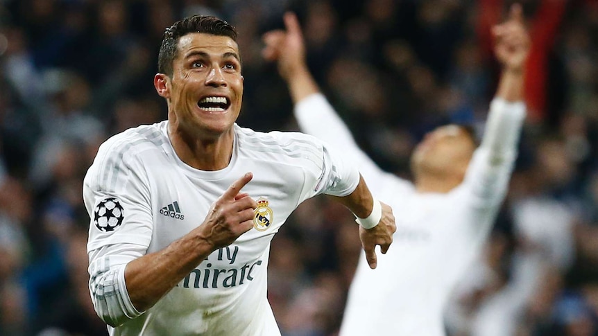 Real Madrid's Cristiano Ronaldo celebrates Champions League hat-trick against Wolfsburg in Madrid.
