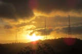 The sun shines over Mount Coot-tha in Brisbane, Queensland.