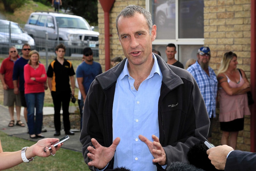 Tasmanian Greens Leader Nick McKim speaks to the media after arriving to cast his vote.