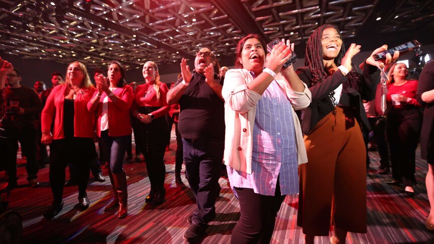 A group of women cheering