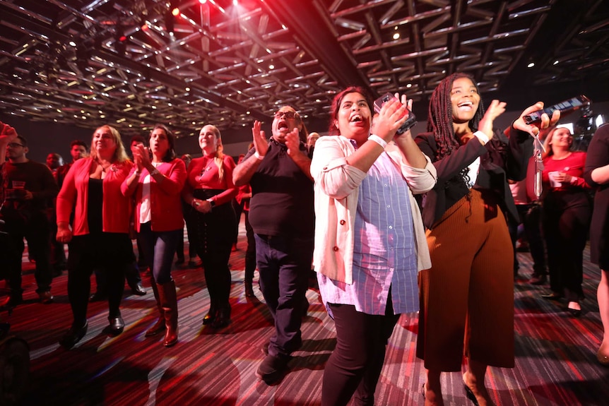 A group of women cheering