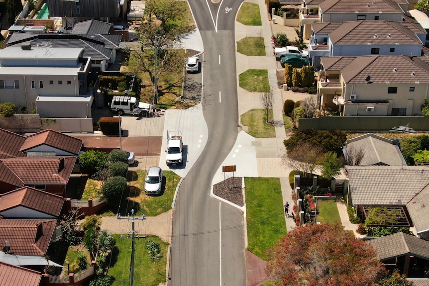 An aerial photo of a suburban street