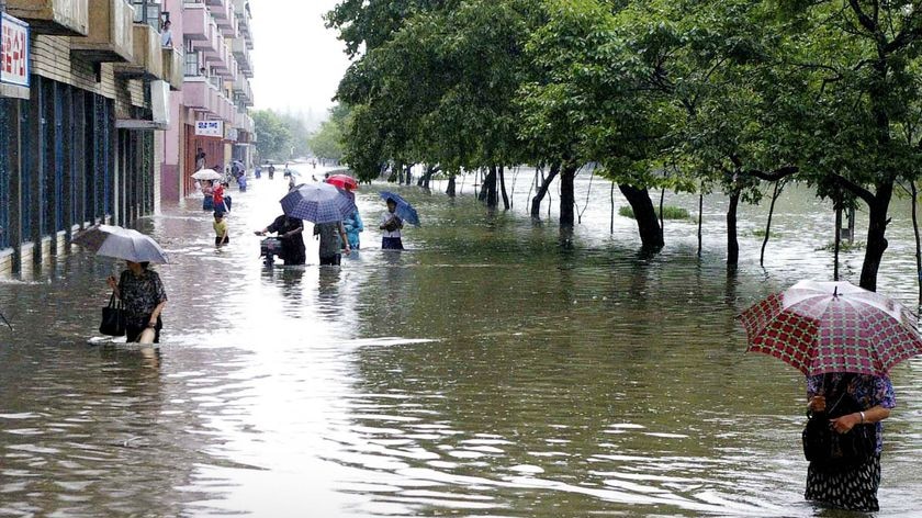 Flooded street in the capital, Pyongyang, during August floods in 2007 that brought a rare admission of widespread damage.