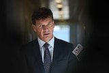 Energy Minister Angus Taylor speaks to the media at Parliament House in December 2018