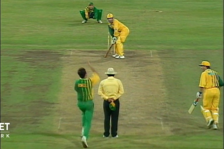 An Australia A bowler comes in to deliver the ball against an Australian batsman at the SCG.