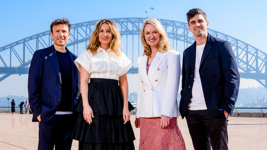 Afterpay founders Anthony Eisen (far left) and Nick Molnar (far right) in front of Sydney Harbour Bridge.