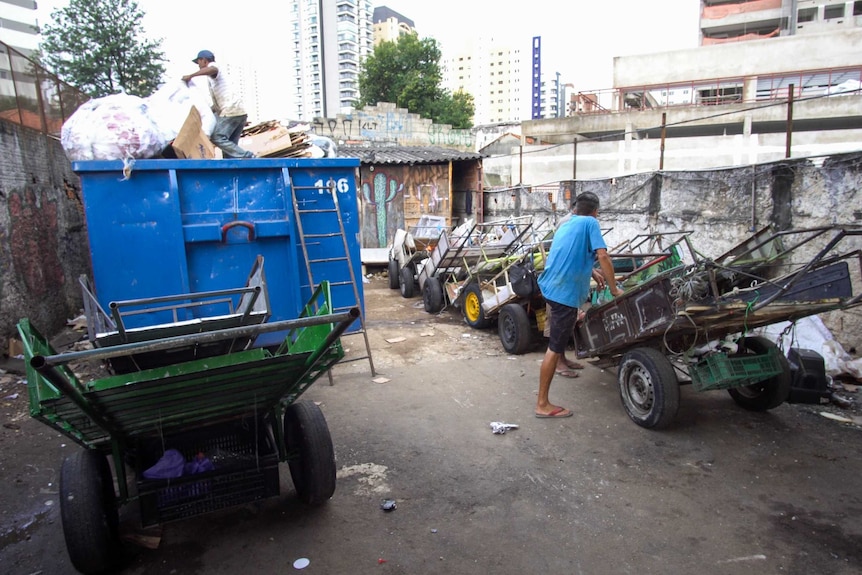 Carrocas, or wagons, lined up in a scrap yard.