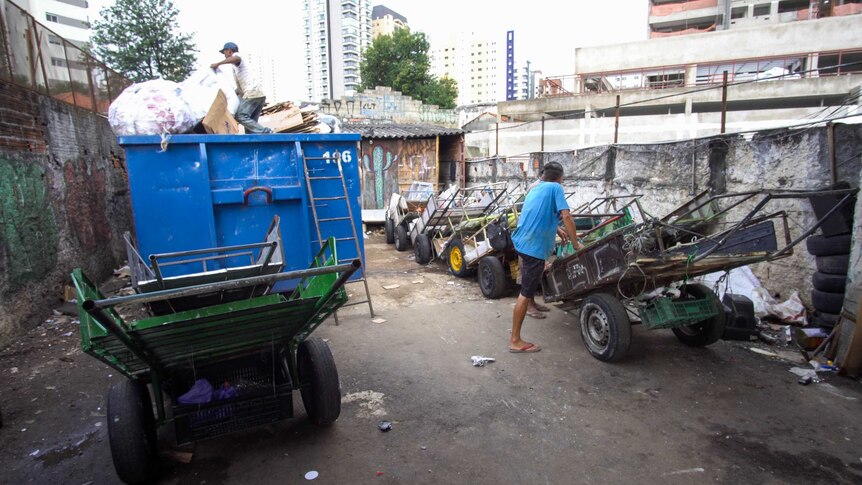 Carrocas, or wagons, lined up in a scrap yard.