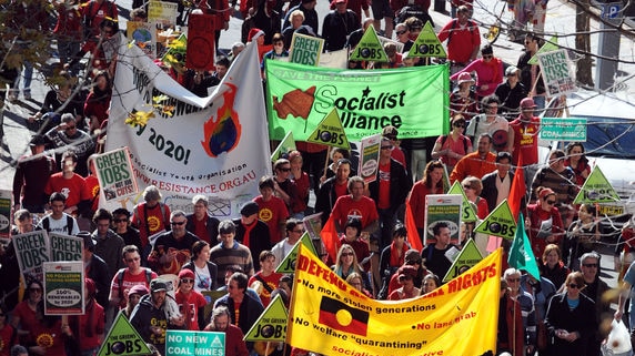 Protesters march through Sydney's CBD during a national climate change emergency rally in June.