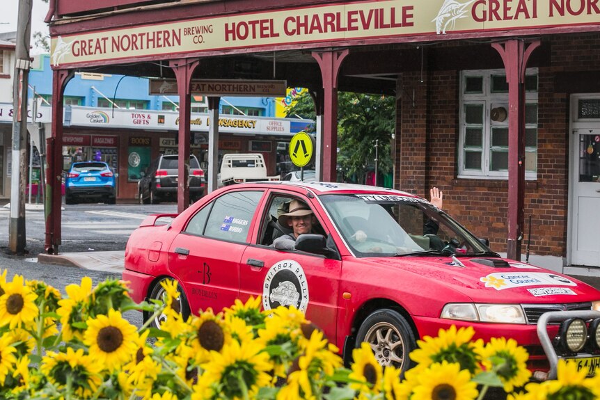 A red car on the streets of Charleville.