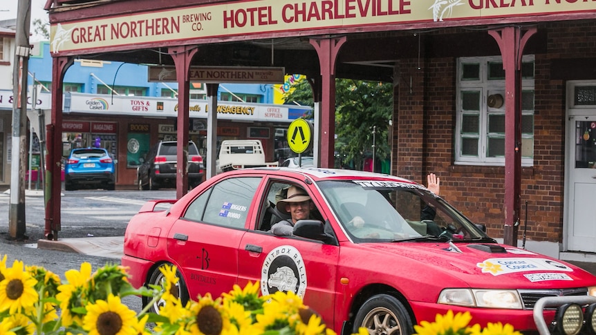A red car on the streets of Charleville.