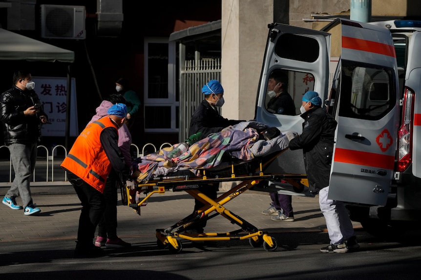 A patient being transported on a stretcher