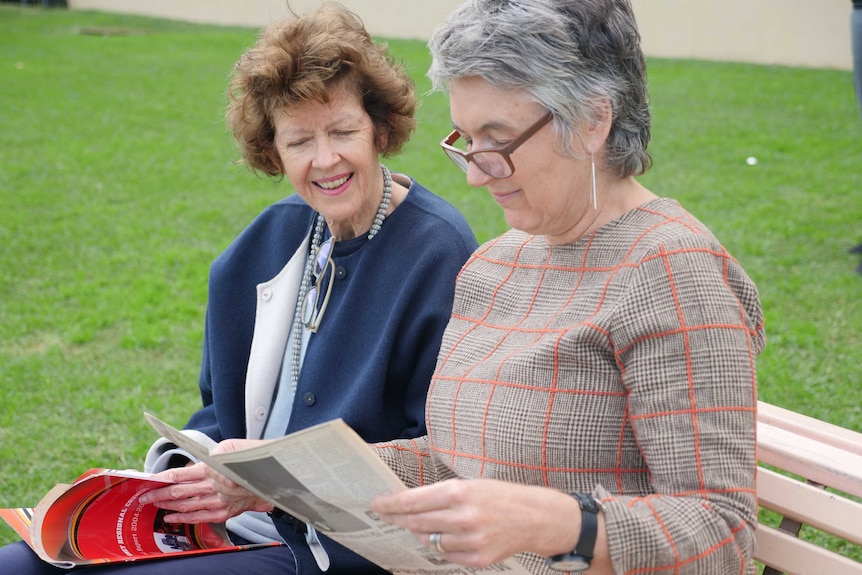 Pia van de Zandt and Fiona Mitchell read old press clippings May 2020.