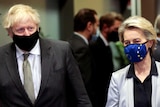British Prime Minister Boris Johnson and European Commission president Ursula von der Leyen walk together.
