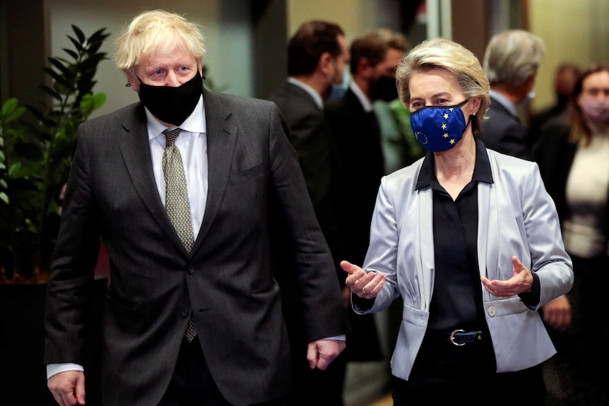 British Prime Minister Boris Johnson and European Commission president Ursula von der Leyen walk together.