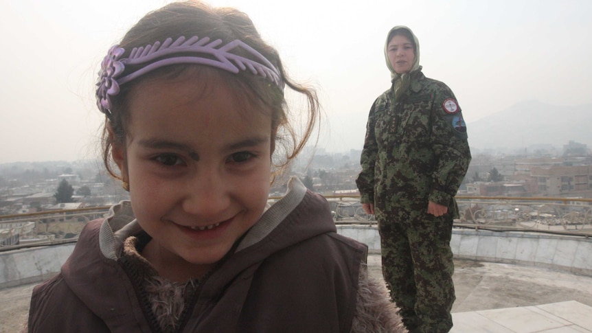 Latifa Nabizada, Afghanistan's sole woman military helicopter pilot, and her daughter Malalai.