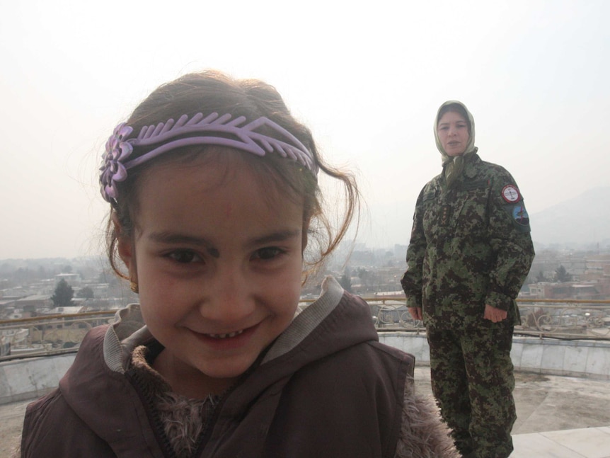 Latifa Nabizada, Afghanistan's sole woman military helicopter pilot, and her daughter Malalai.