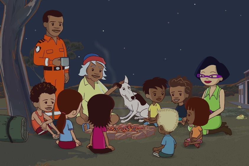 In an animated night scene a man in orange uniform stands with 7 children, 2 women and a dog around campfire under tree.