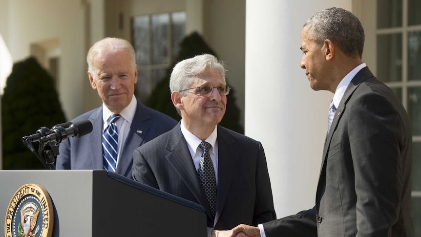 Barack Obama shakes hands with his Supreme Court nominee Merrick Garland.