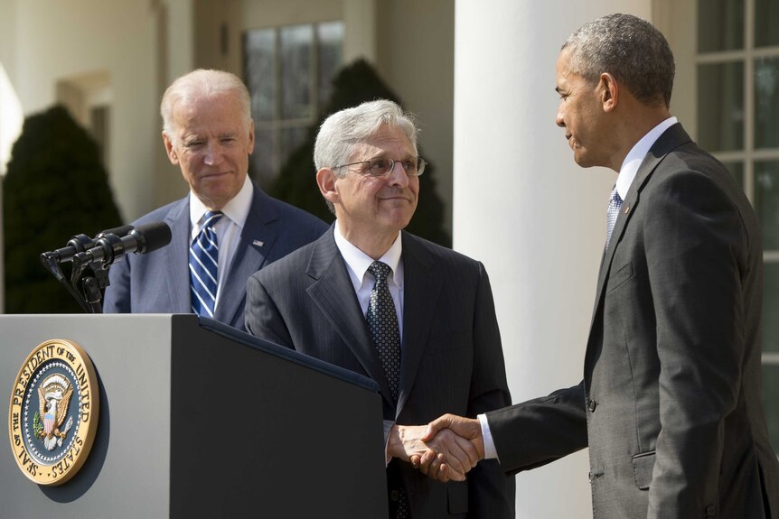 US President Barack Obama shakes hands with his Supreme Court nominee Merrick Garland.