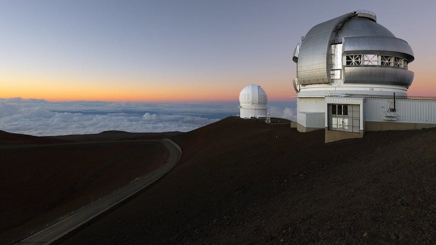 Observatory with clouds in the distance