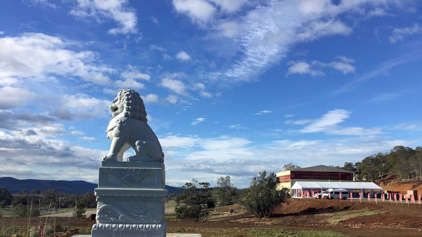 Guardian Lion statue at Tasmanian Buddhist temple site unveiled May 15 2016