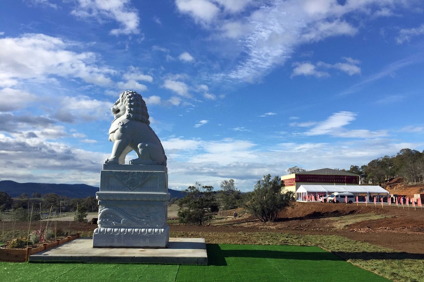 Guardian Lion statue at Tasmanian Buddhist temple site unveiled May 15 2016