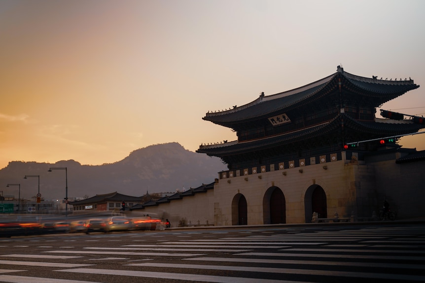 Night falls over Seoul.