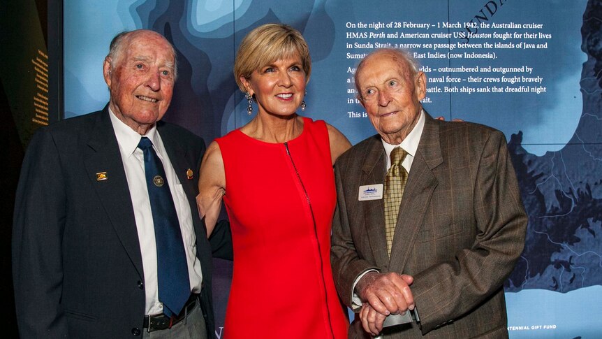 Two men in military uniform next to Foreign Minister Julie Bishop on a stage.